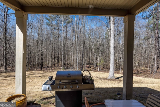 view of yard featuring a wooded view