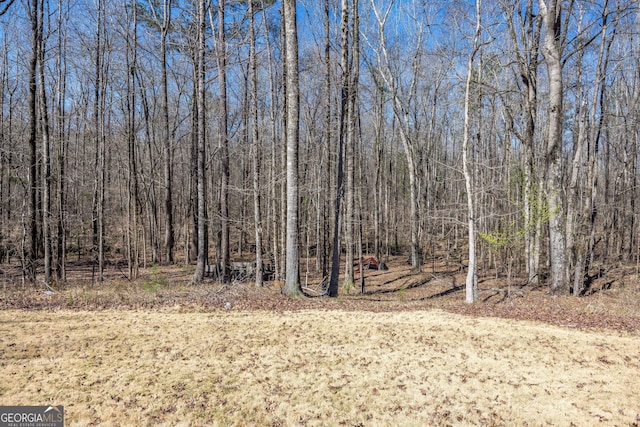 view of landscape with a view of trees