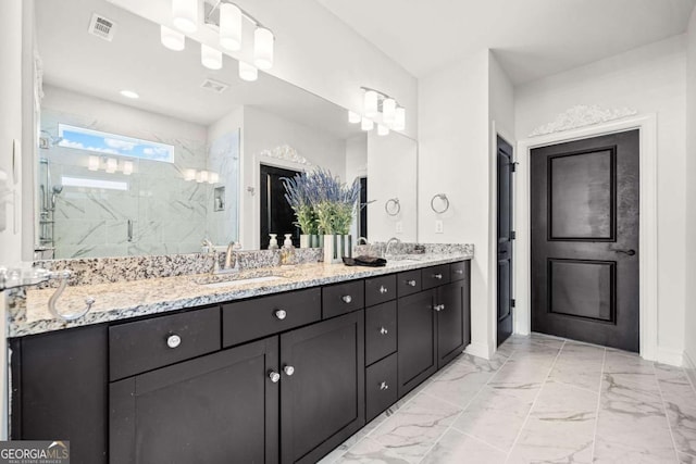 full bathroom featuring visible vents, marble finish floor, a sink, a marble finish shower, and double vanity