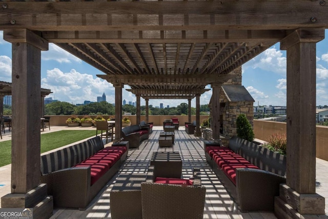 view of patio with a pergola and an outdoor hangout area