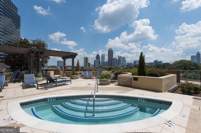 view of pool featuring a patio area, a view of city, and a pergola