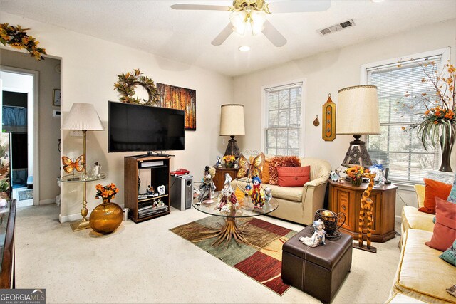 11 Tallulah Ct, Jonesboro, GA 30236 - living room with ceiling fan and carpet flooring