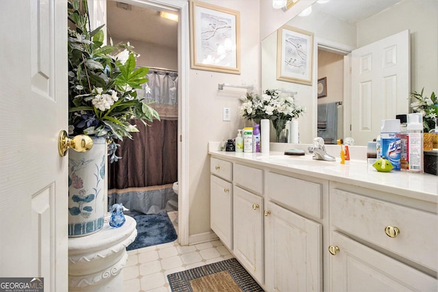 11 Tallulah Ct, Jonesboro, GA 30236 - bathroom with vanity and tile patterned floors