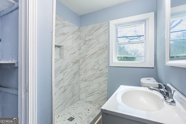 full bath featuring a stall shower and vanity