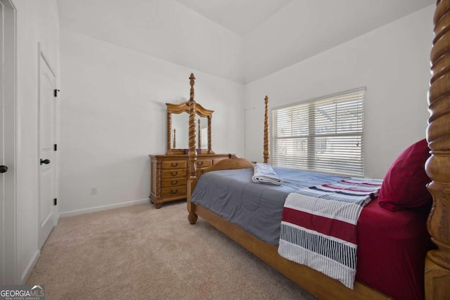 bedroom featuring baseboards and carpet floors