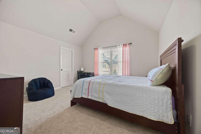 bedroom featuring visible vents, carpet floors, baseboards, and vaulted ceiling