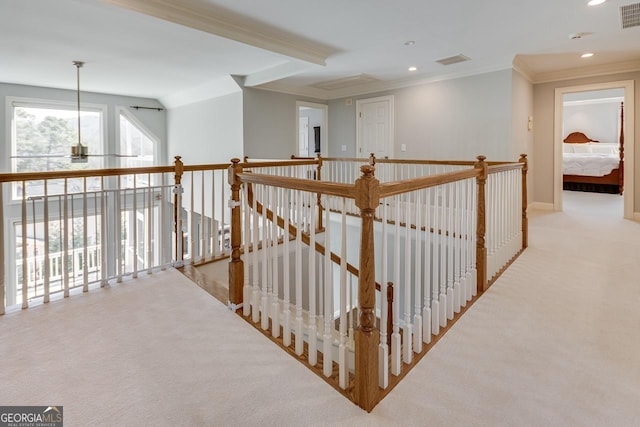 hallway with recessed lighting, visible vents, carpet flooring, and crown molding