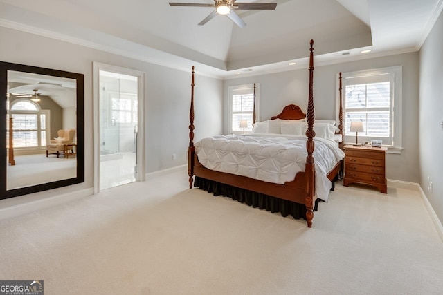 carpeted bedroom with multiple windows, crown molding, and vaulted ceiling