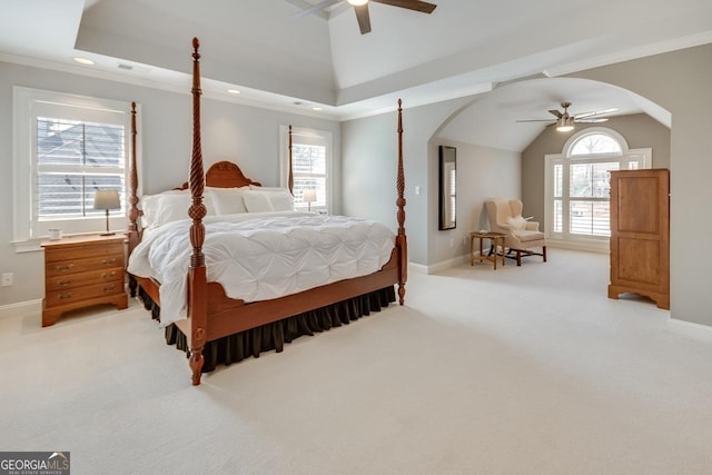 bedroom with arched walkways, lofted ceiling, light carpet, and crown molding