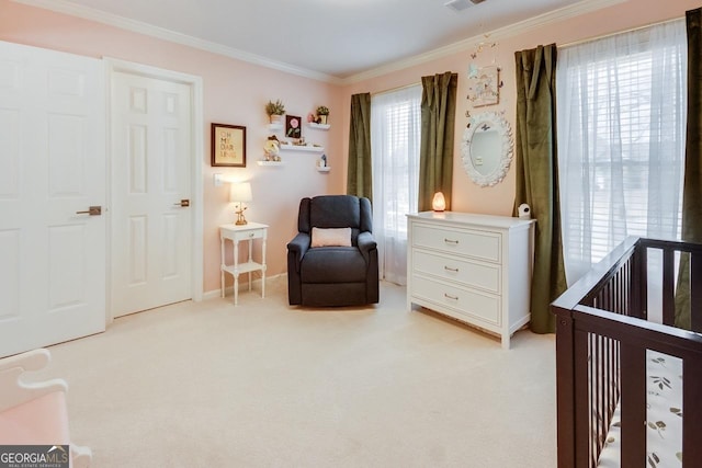 bedroom with visible vents, a crib, baseboards, light colored carpet, and ornamental molding