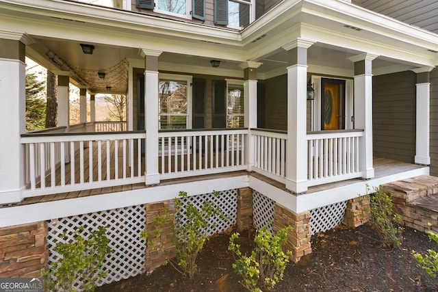 deck with covered porch