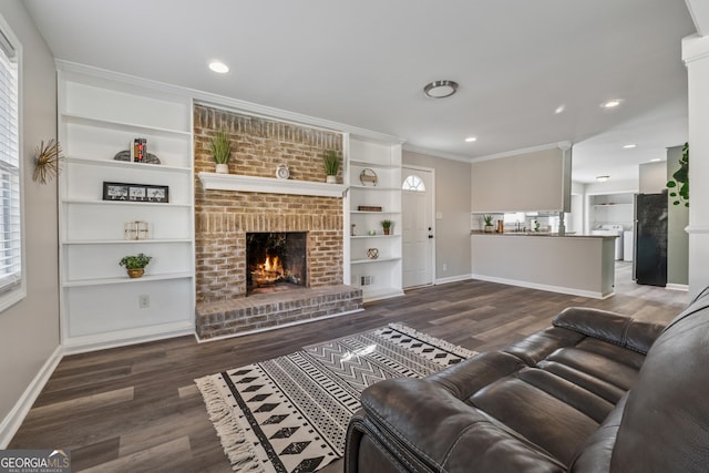 hallway featuring carpet and baseboards