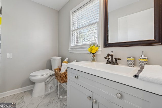 carpeted spare room with visible vents, a healthy amount of sunlight, and baseboards