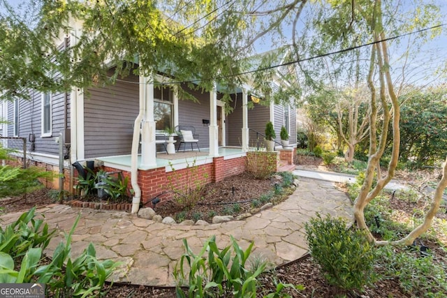 exterior space featuring covered porch