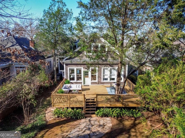 view of front of house featuring a wooden deck