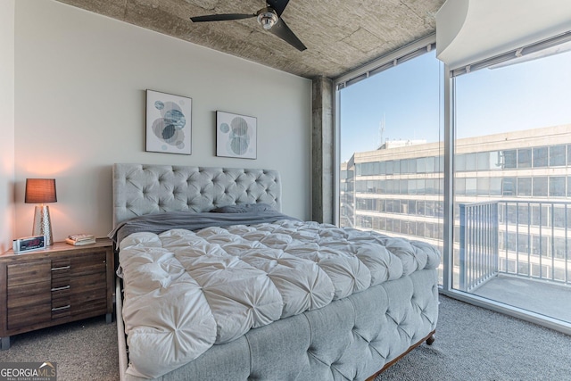 carpeted bedroom featuring access to exterior and ceiling fan