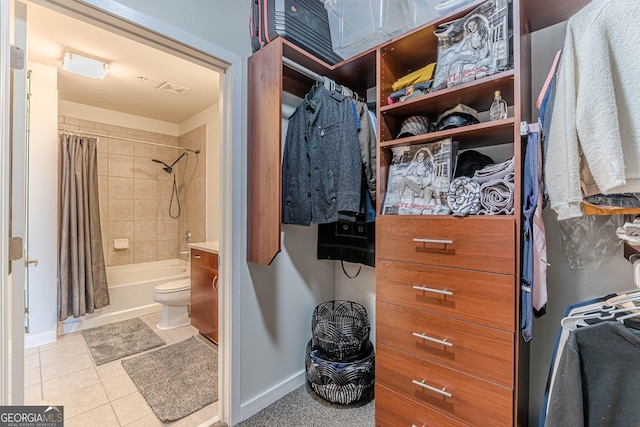 spacious closet with visible vents and tile patterned flooring