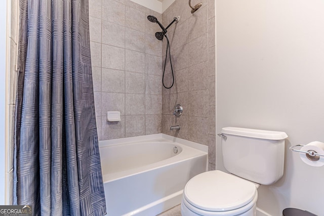 full bathroom featuring toilet and shower / tub combo