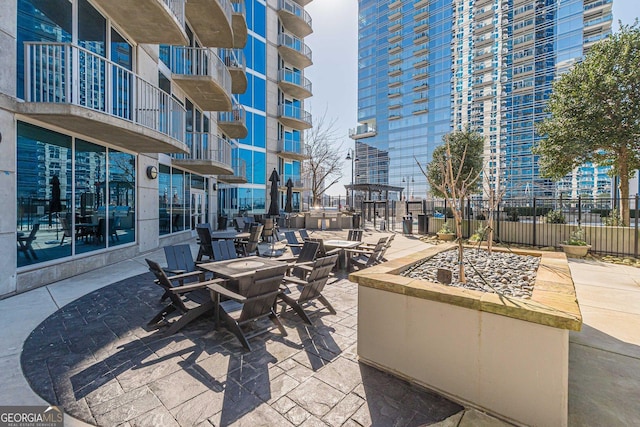 view of patio featuring a fire pit