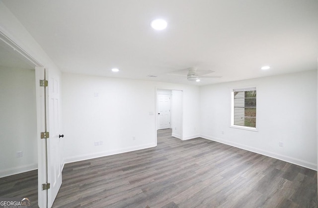 spare room with recessed lighting, dark wood-style floors, baseboards, and ceiling fan