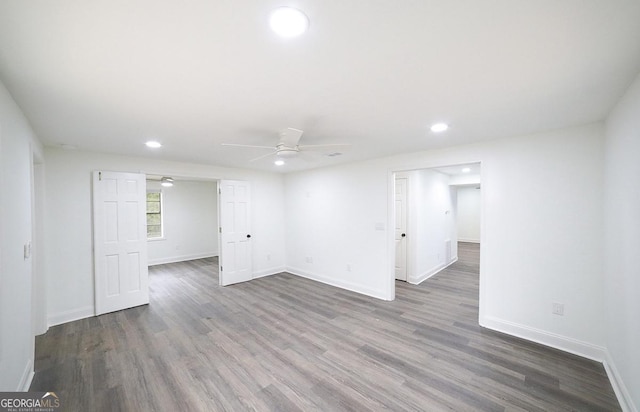 unfurnished room with recessed lighting, baseboards, a ceiling fan, and wood finished floors