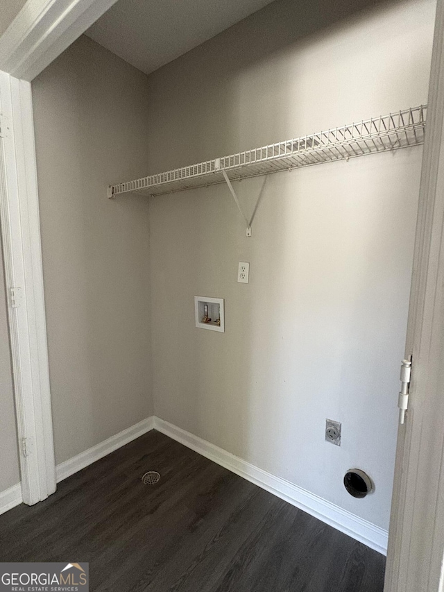 washroom featuring washer hookup, dark wood-style floors, baseboards, hookup for an electric dryer, and laundry area