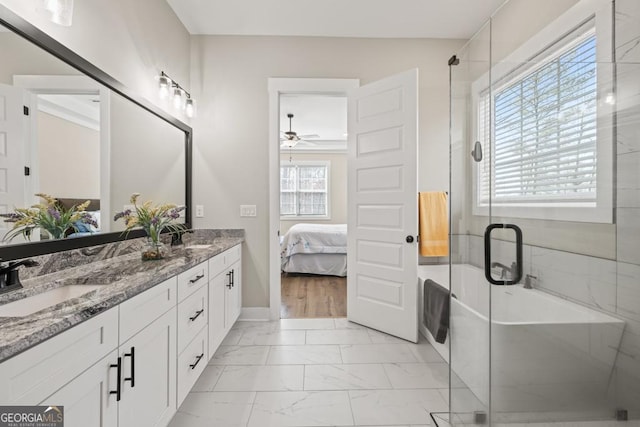 ensuite bathroom featuring a shower stall, double vanity, marble finish floor, ensuite bath, and a sink