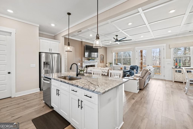 212 Cardiff Ct, Ball Ground, GA 30107 - kitchen with a sink, appliances with stainless steel finishes, a ceiling fan, light wood-type flooring, and recessed lighting