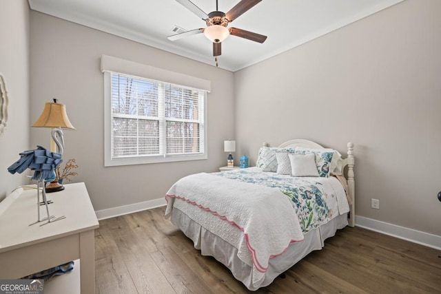 212 Cardiff Ct, Ball Ground, GA 30107 - bedroom with wood finished floors, baseboards, and a ceiling fan