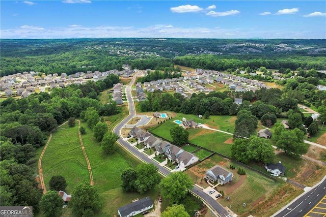 bird's eye view with a residential view and a forest view