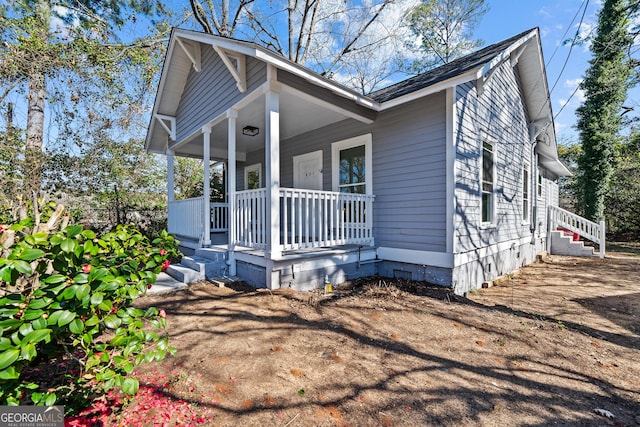 view of home's exterior with a porch