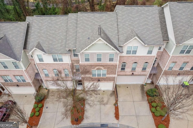 view of front of home featuring driveway and an attached garage