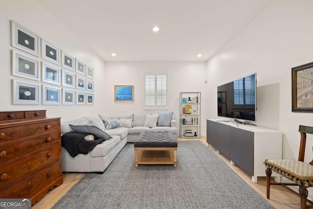 living area with recessed lighting