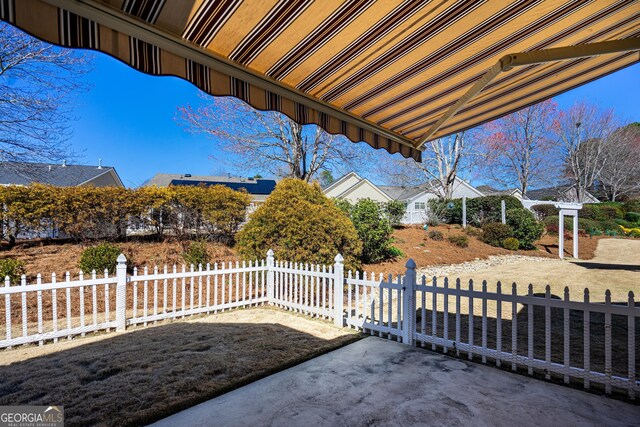 view of patio with fence