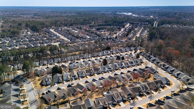 birds eye view of property with a residential view