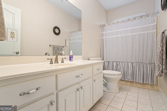 bathroom with vanity, tile patterned floors, curtained shower, and toilet