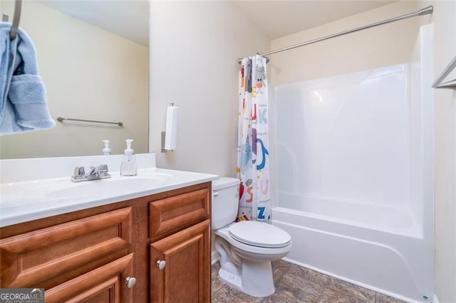 bathroom featuring shower / bath combination with curtain, toilet, and vanity