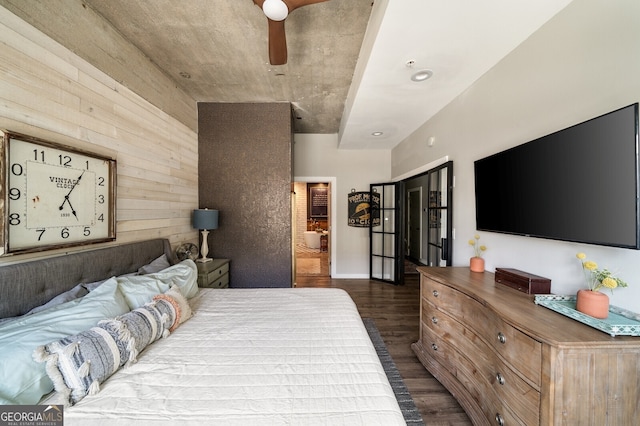 bedroom with dark wood-style floors and a ceiling fan