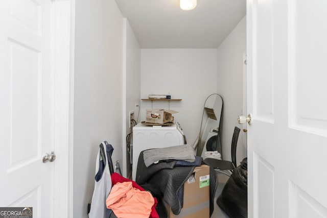 clothes washing area with laundry area and independent washer and dryer