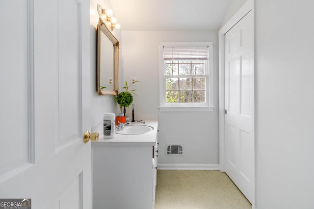 bathroom featuring visible vents and vanity