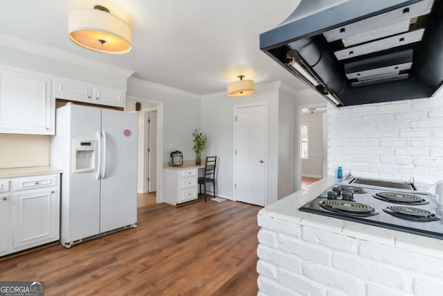 kitchen with white cabinetry, black electric cooktop, exhaust hood, and white fridge with ice dispenser