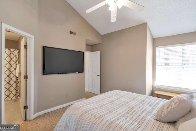 bedroom featuring visible vents, light carpet, baseboards, ceiling fan, and vaulted ceiling