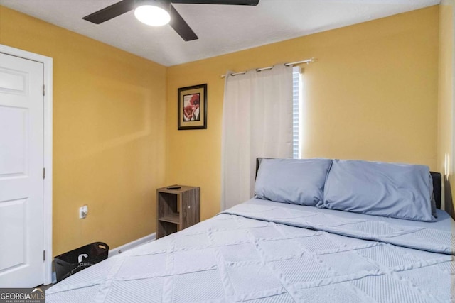 bedroom featuring ceiling fan