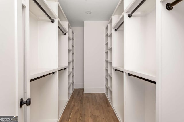 1103 Boulevard Dr SE, Atlanta, GA 30317 - walk in closet featuring wood finished floors
