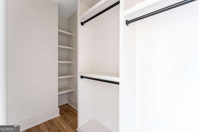 1103 Boulevard Dr SE, Atlanta, GA 30317 - spacious closet featuring a barn door and wood finished floors