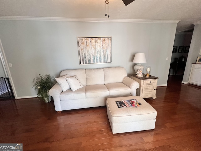 living area with baseboards, dark wood-style flooring, and ornamental molding