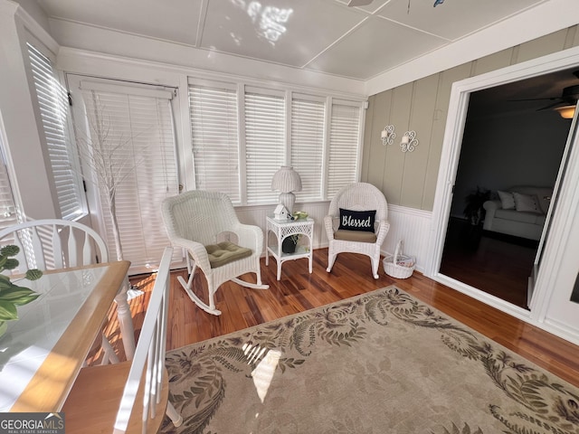 sitting room featuring wood finished floors