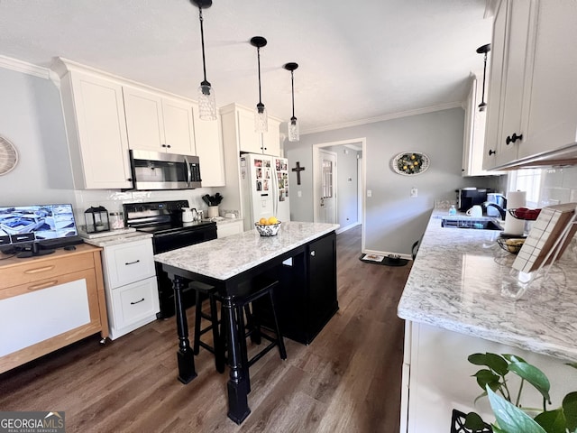 kitchen featuring ornamental molding, black electric range, stainless steel microwave, a kitchen island, and white fridge with ice dispenser