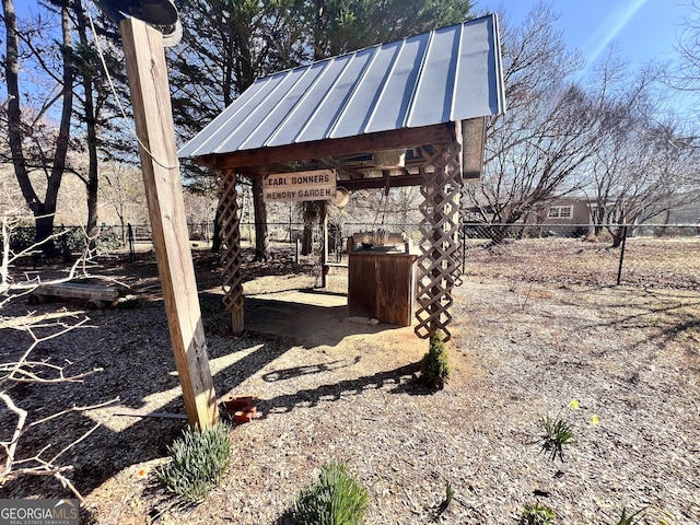 view of yard featuring a gazebo and fence