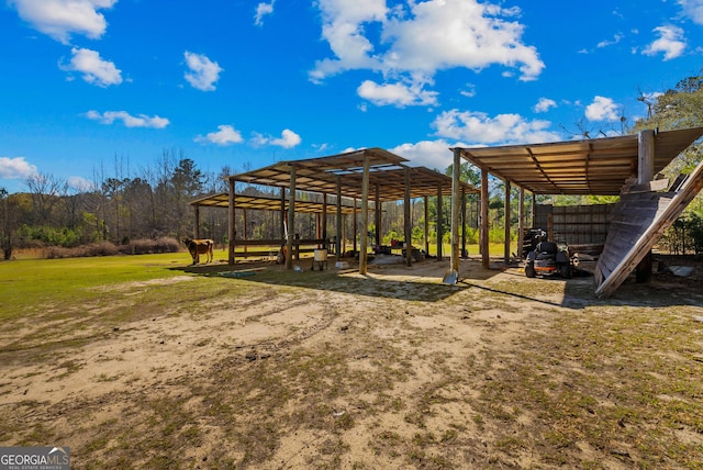 view of yard with a detached carport